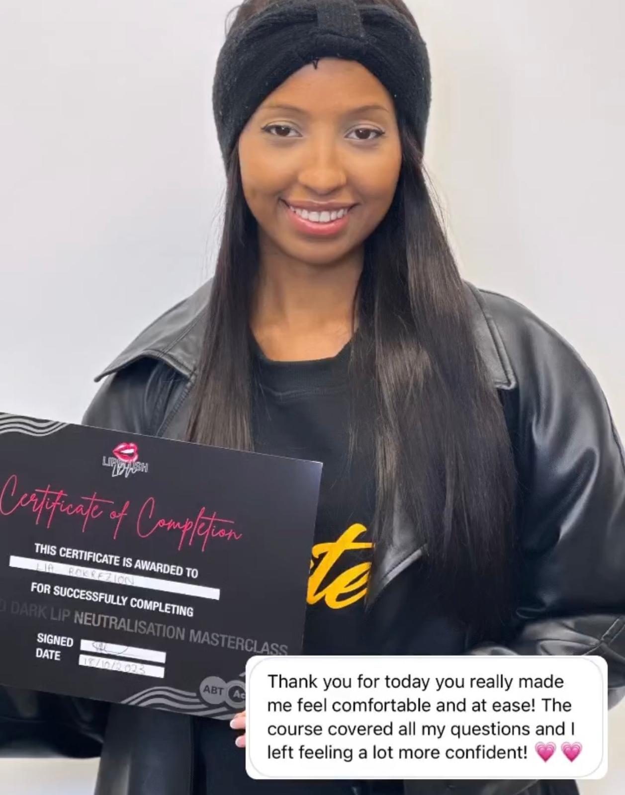 Lia holding her Dark Lip Neutralisation certificate, with her review written on the picture